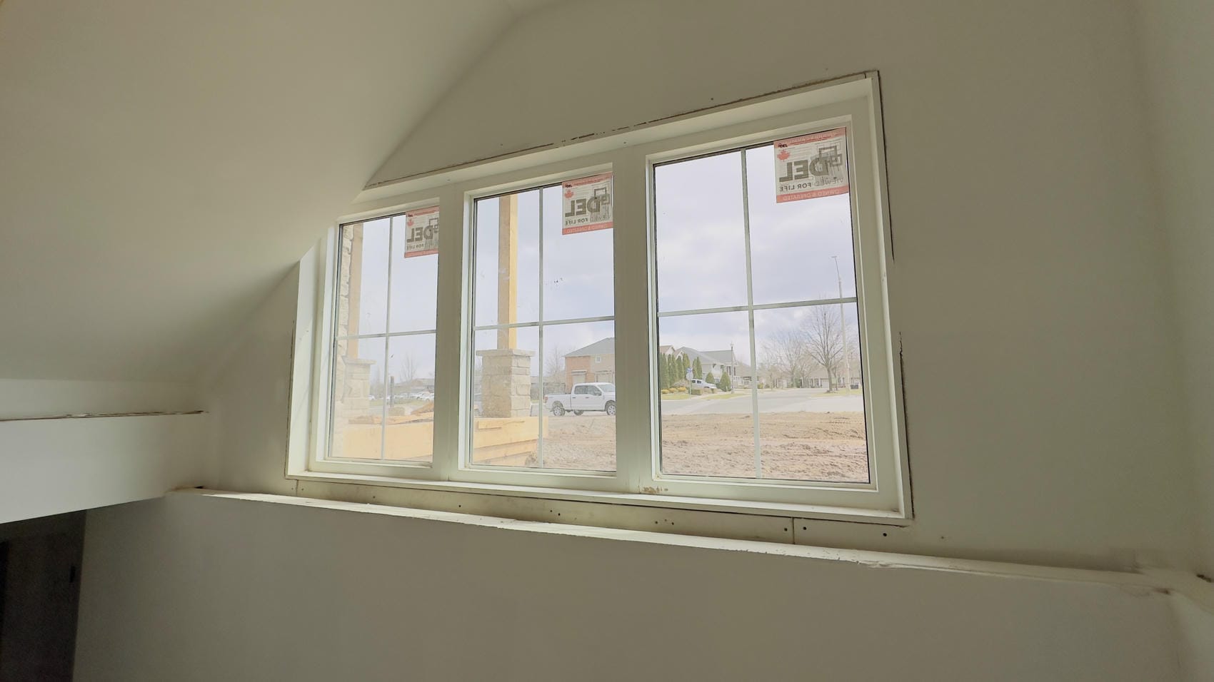 New build black exterior window installation