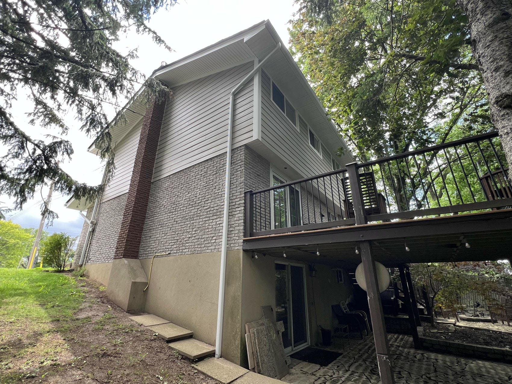 Completed James Hardie lap siding renovation by Renovation Xperts Group in Hamilton