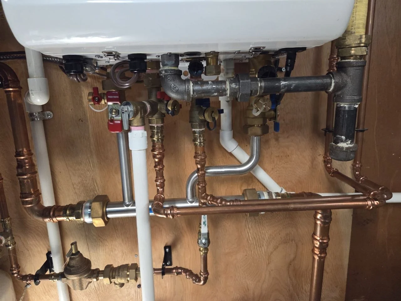 Heating-system copper pipework, valves and equipment connections