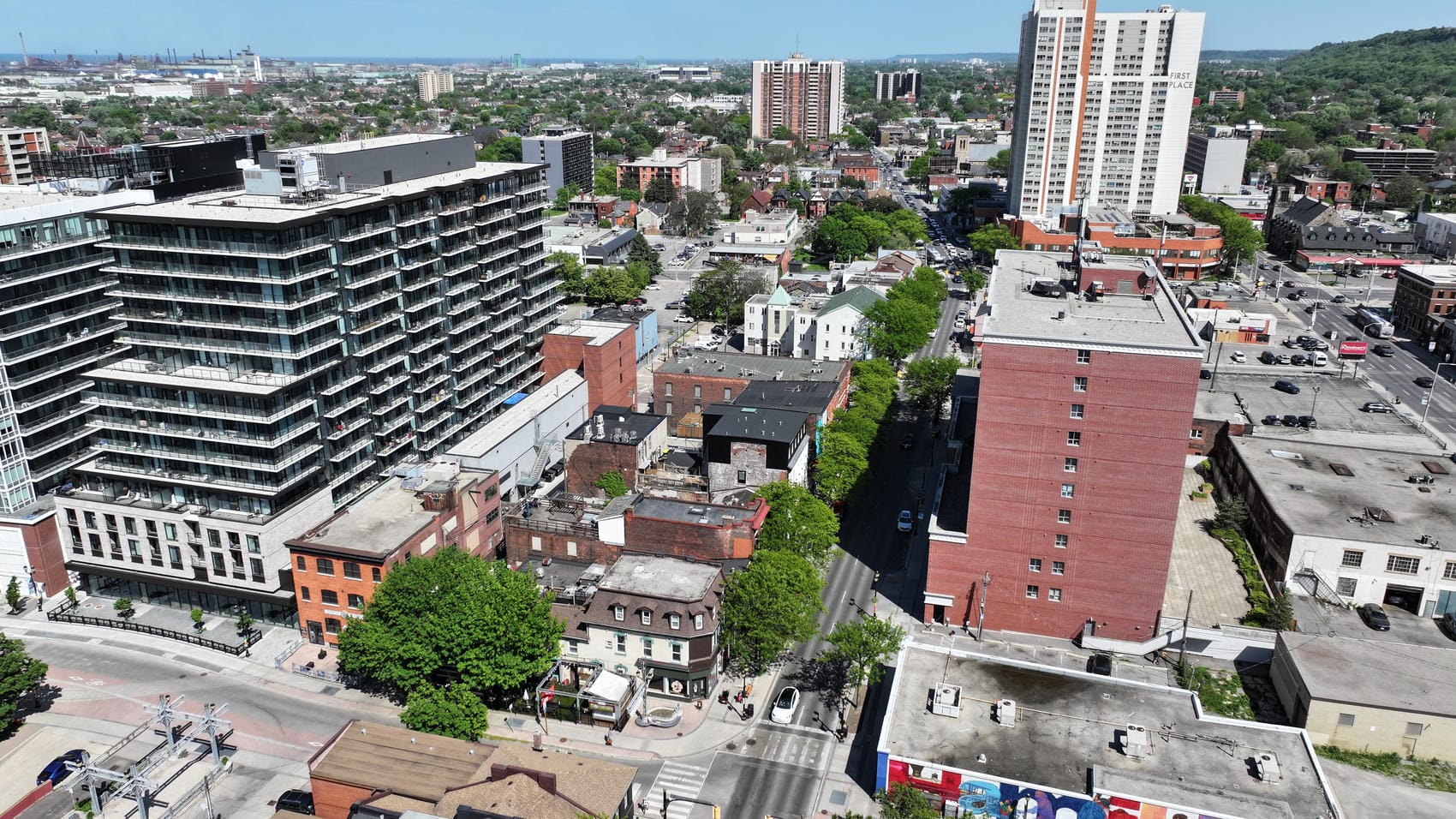 Aerial view of finished four-storey commercial exterior renovation in Hamilton