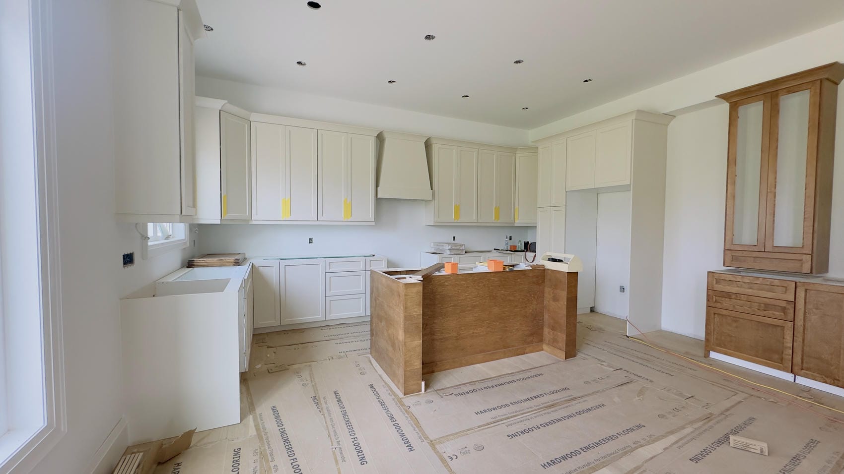 Painted kitchen walls, ceiling, and cabinetry areas in Niagara new build