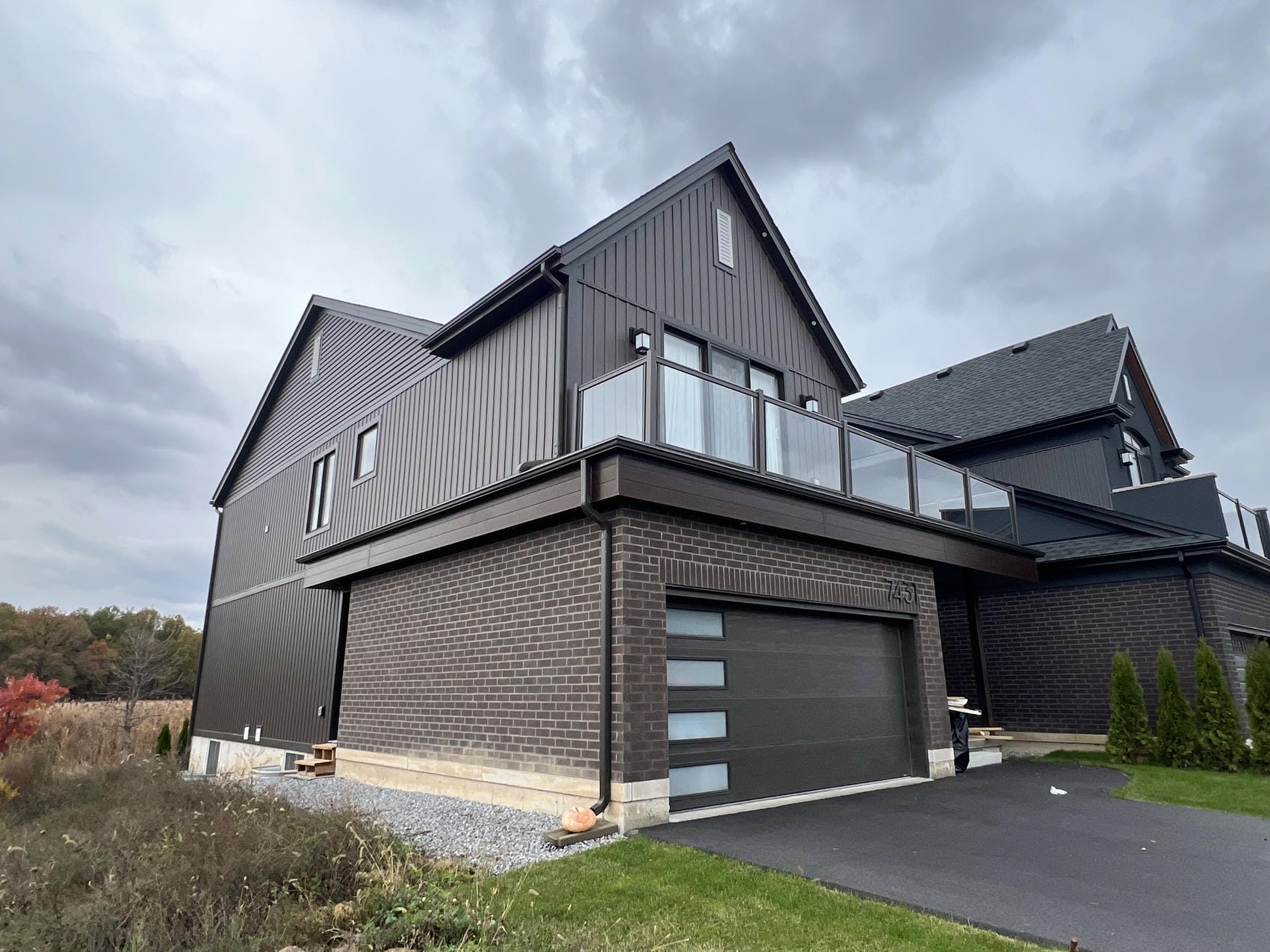 Full vinyl board and batten new build exterior in Niagara Falls, Ontario