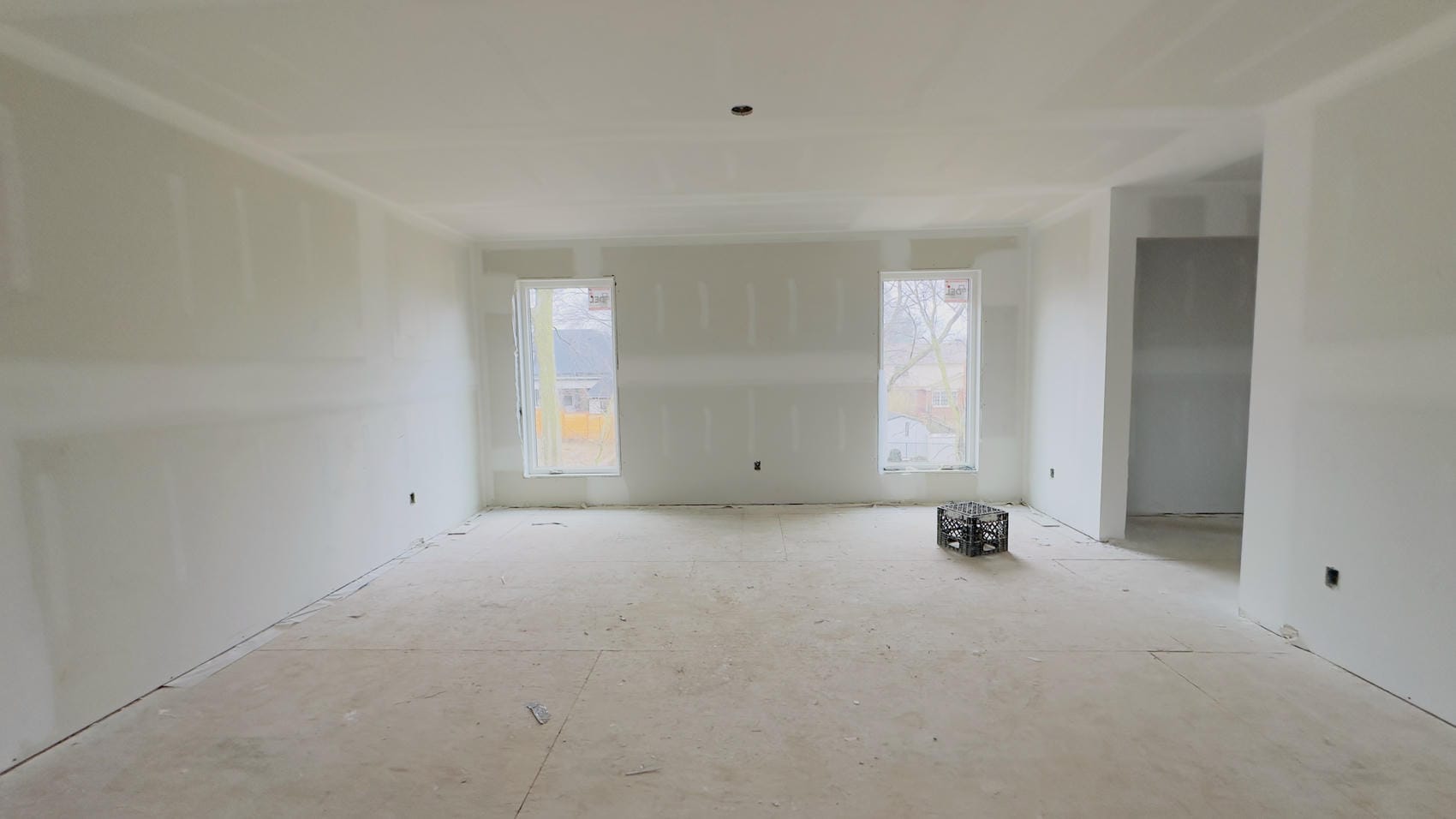 Newly boarded drywall walls and ceiling in Niagara new build interior