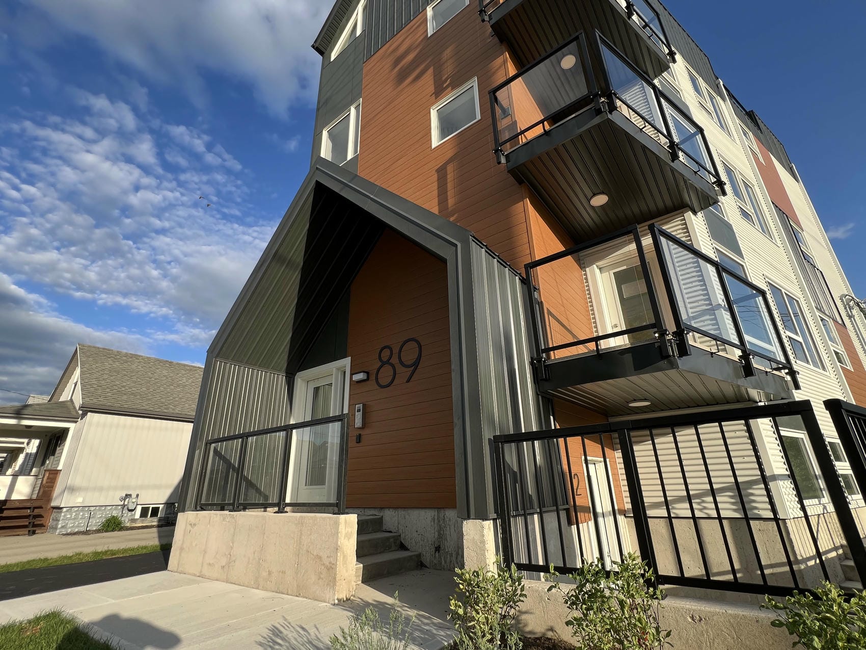 Commercial building exterior renovation by Renovation Xperts Group