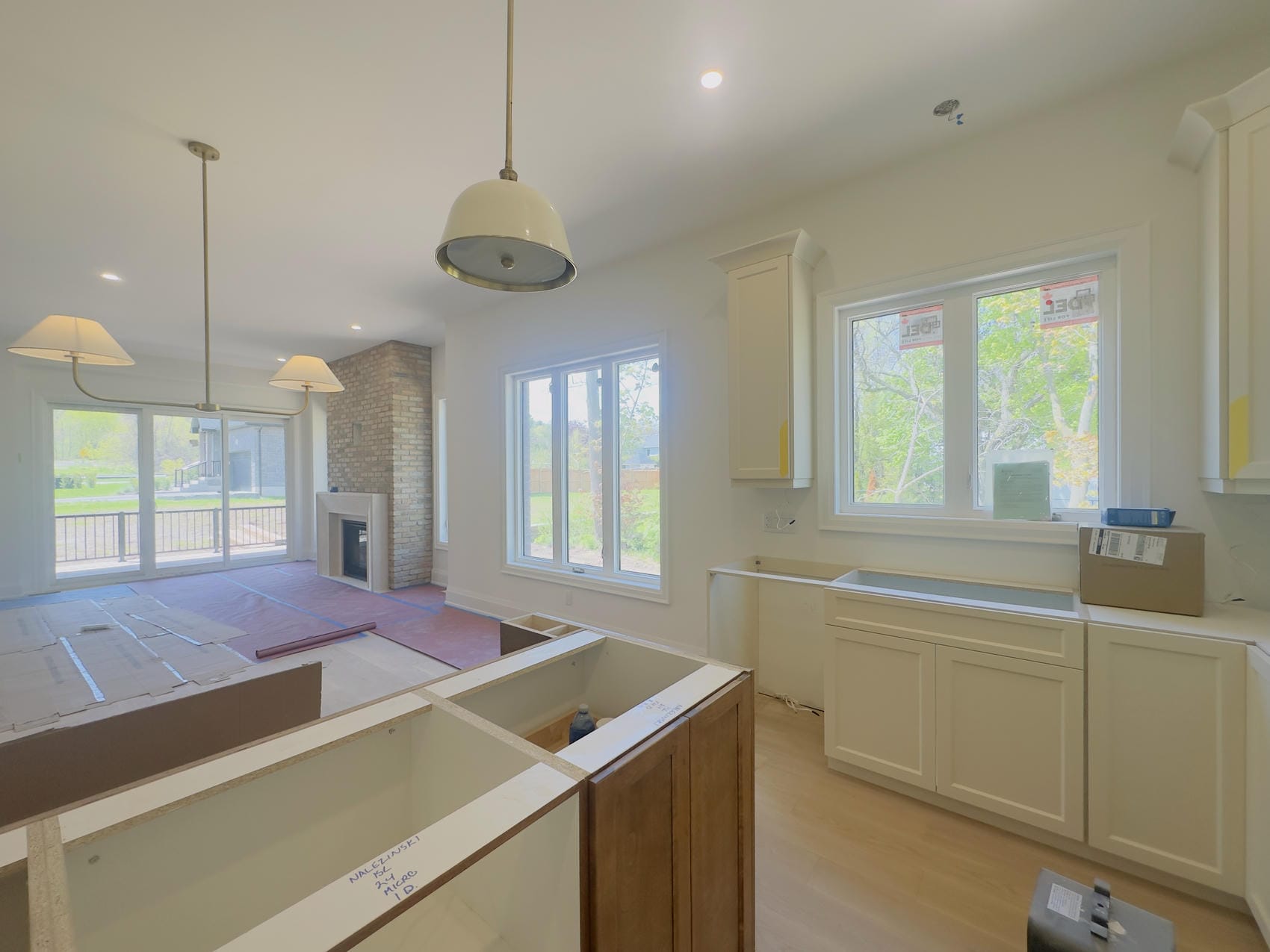 Freshly painted open concept kitchen and living area interior in Niagara