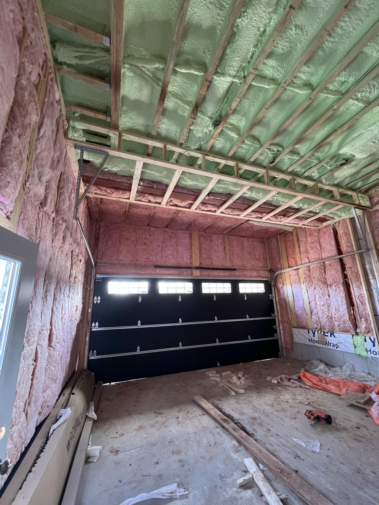 Spray foam garage ceiling insulation and rim joist air sealing in Niagara