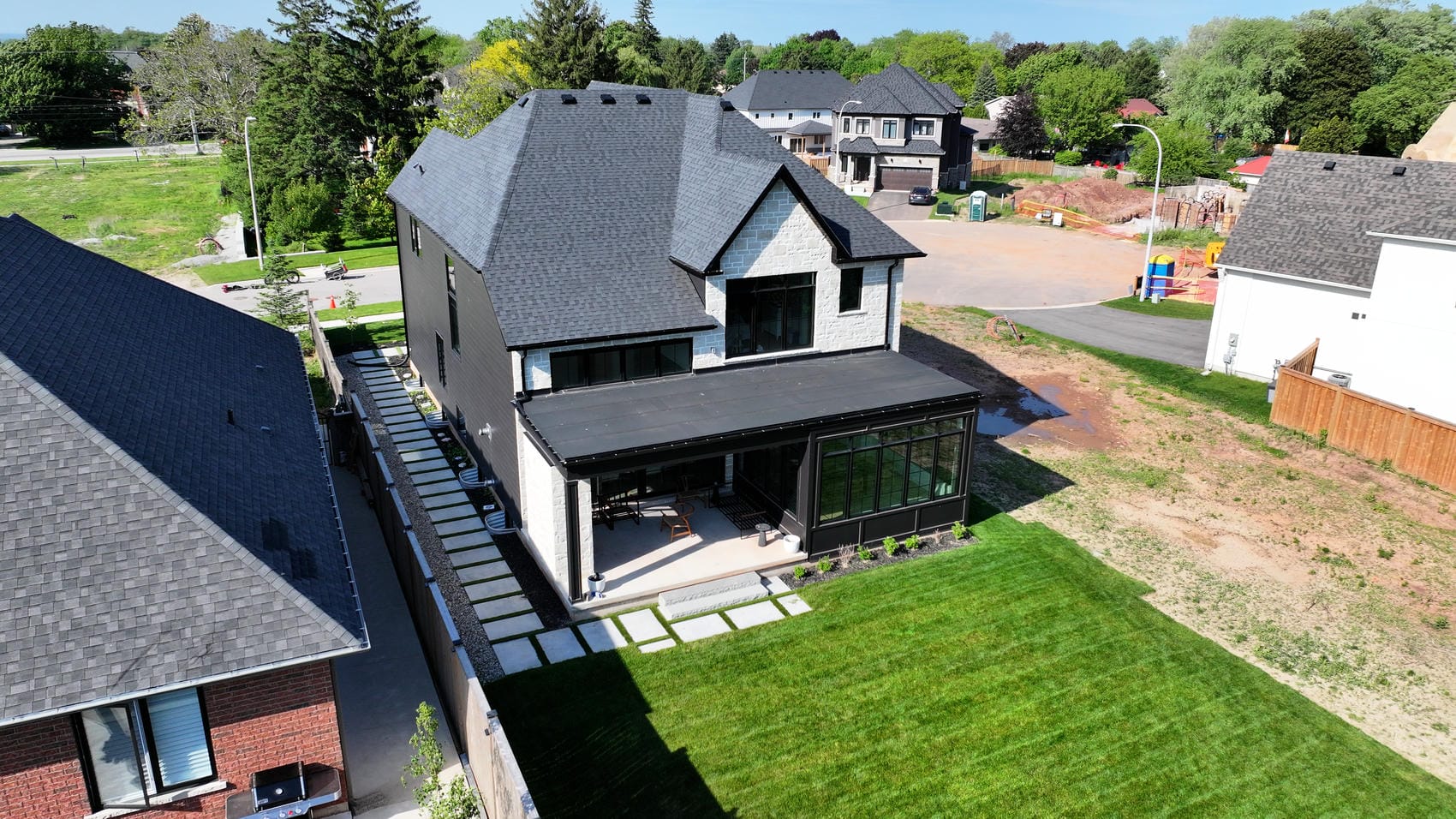Completed new build exterior package by Renovation Xperts Group in Stoney Creek