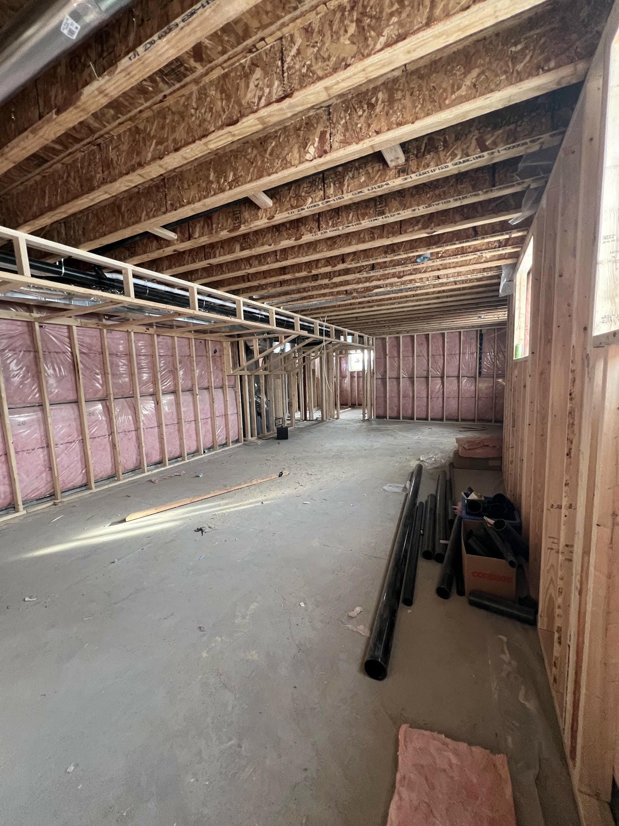 Basement framing with mechanical bulkhead in Niagara renovation