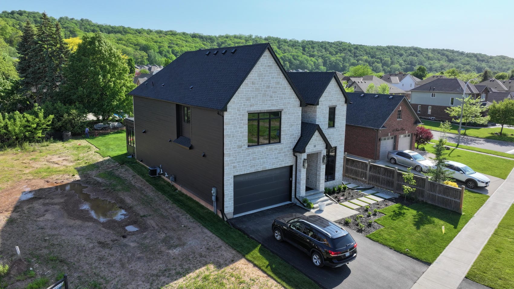 Horizontal fiber cement siding on custom home in Stoney Creek