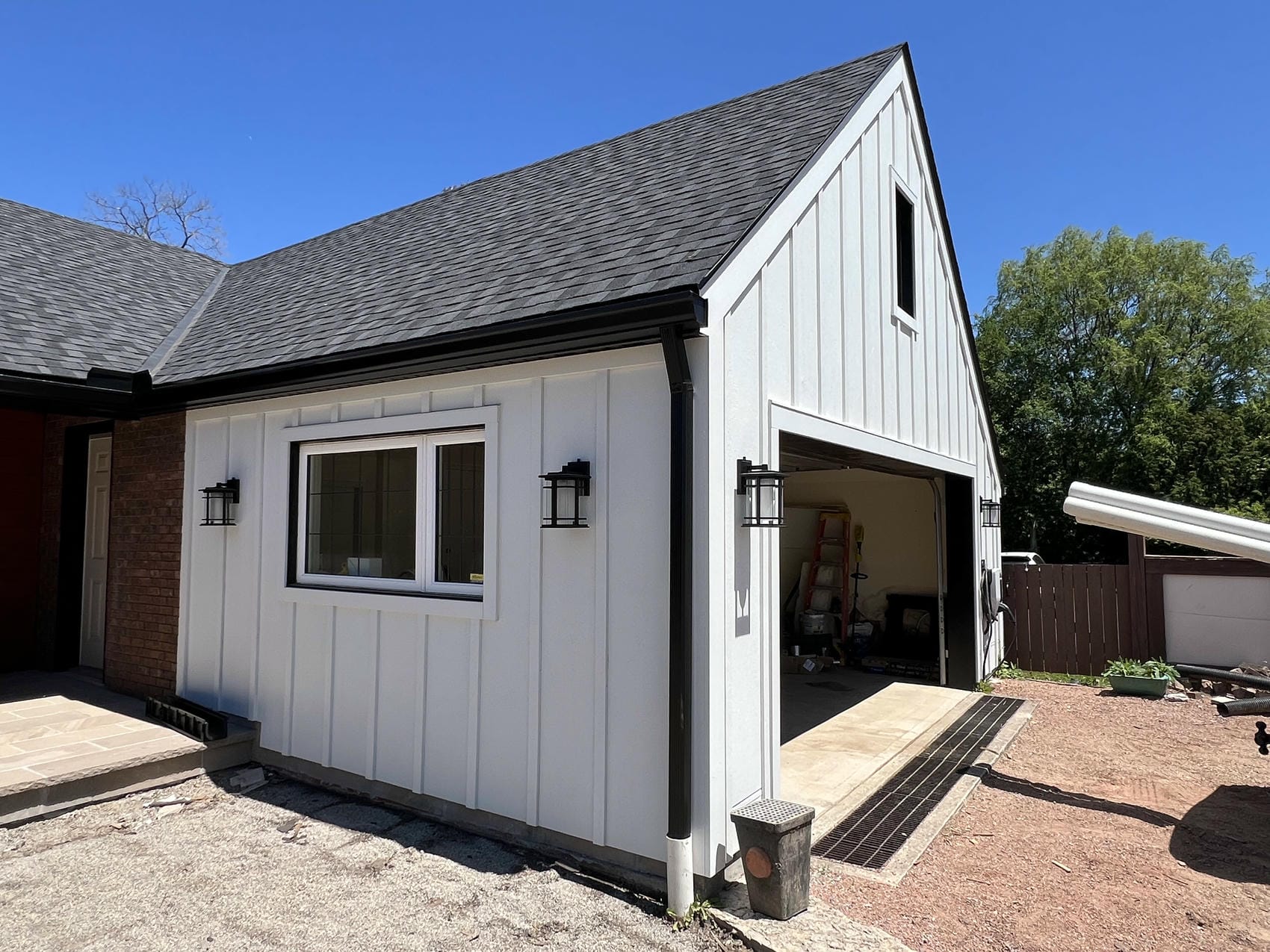Completed James Hardie board and batten exterior renovation by Renovation Xperts Group in Niagara-on-the-Lake