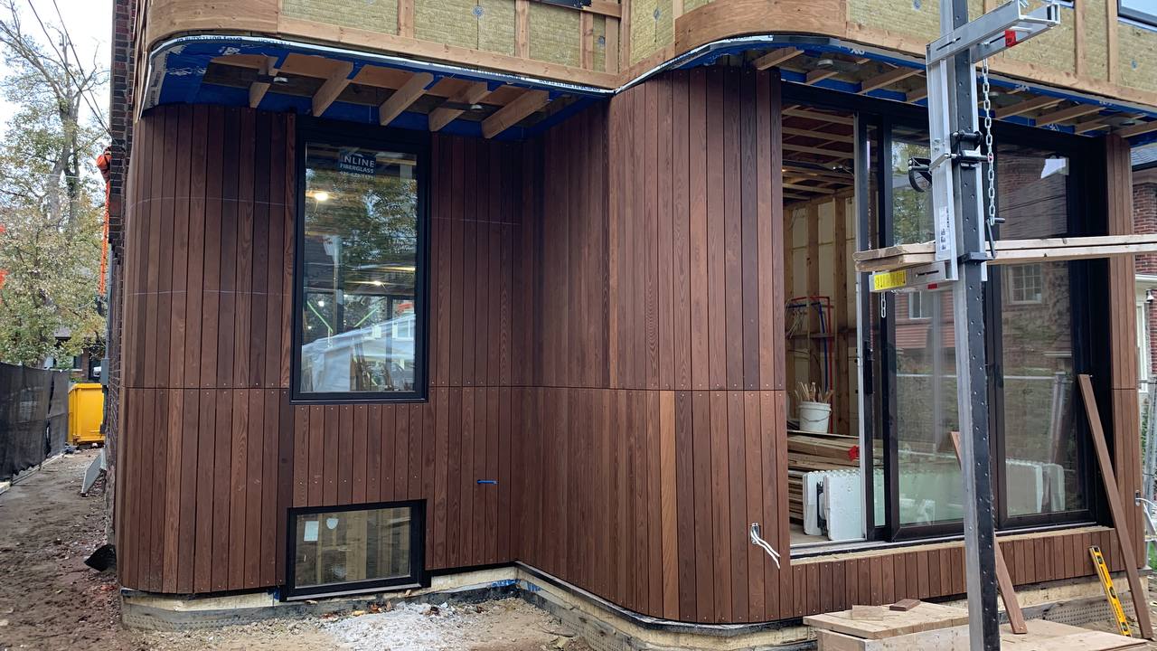 Close-up of high-end wood siding with rounded corners in Niagara Region