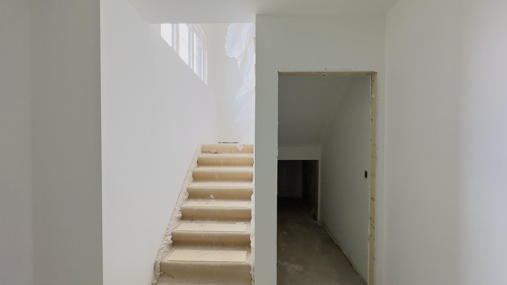 Painted stairway walls and ceiling in Niagara residential interior