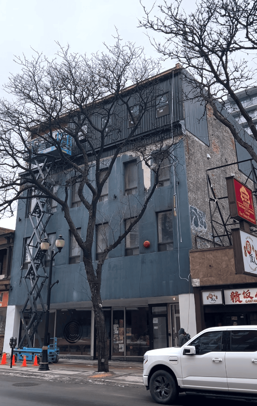 Front elevation stucco replacement on commercial building in Hamilton