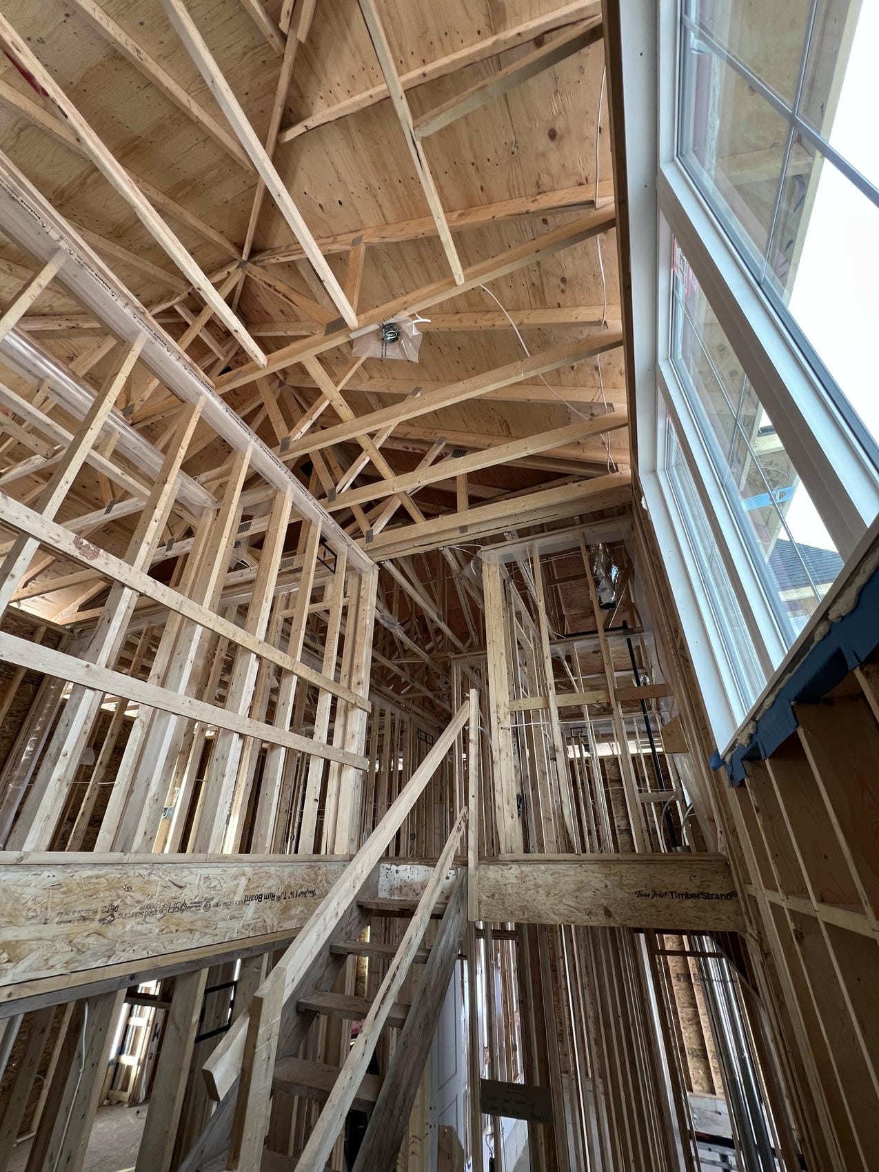 Two-storey interior framing and staircase in Niagara new build