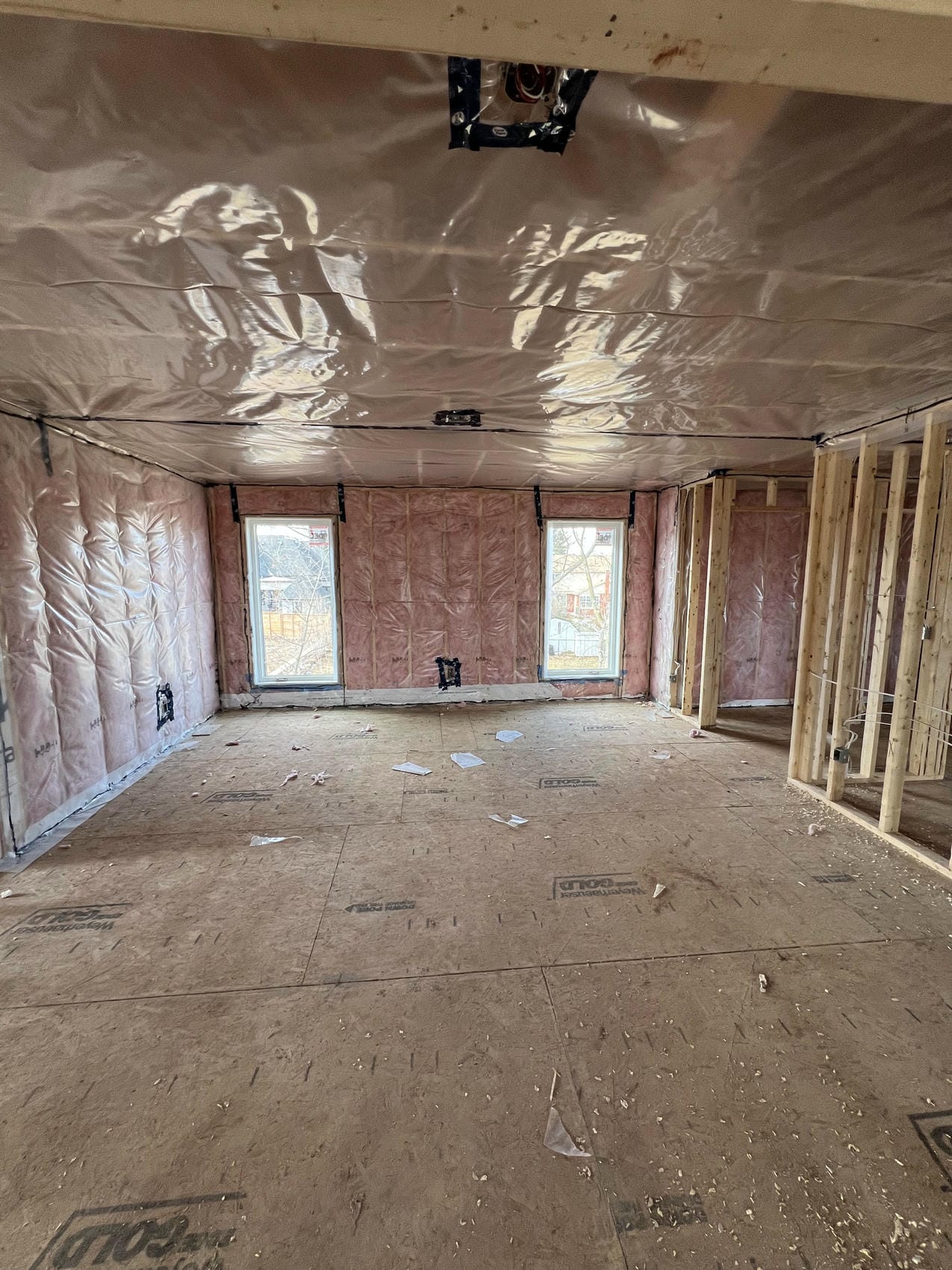 Fibreglass batt insulation with sealed vapour barrier in Niagara home