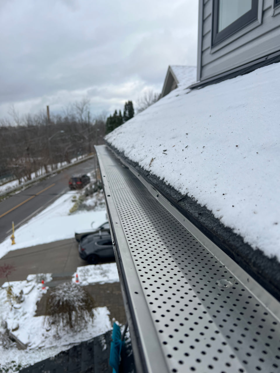 Newly installed leaf guard protection over aluminum eavestrough in Niagara Region