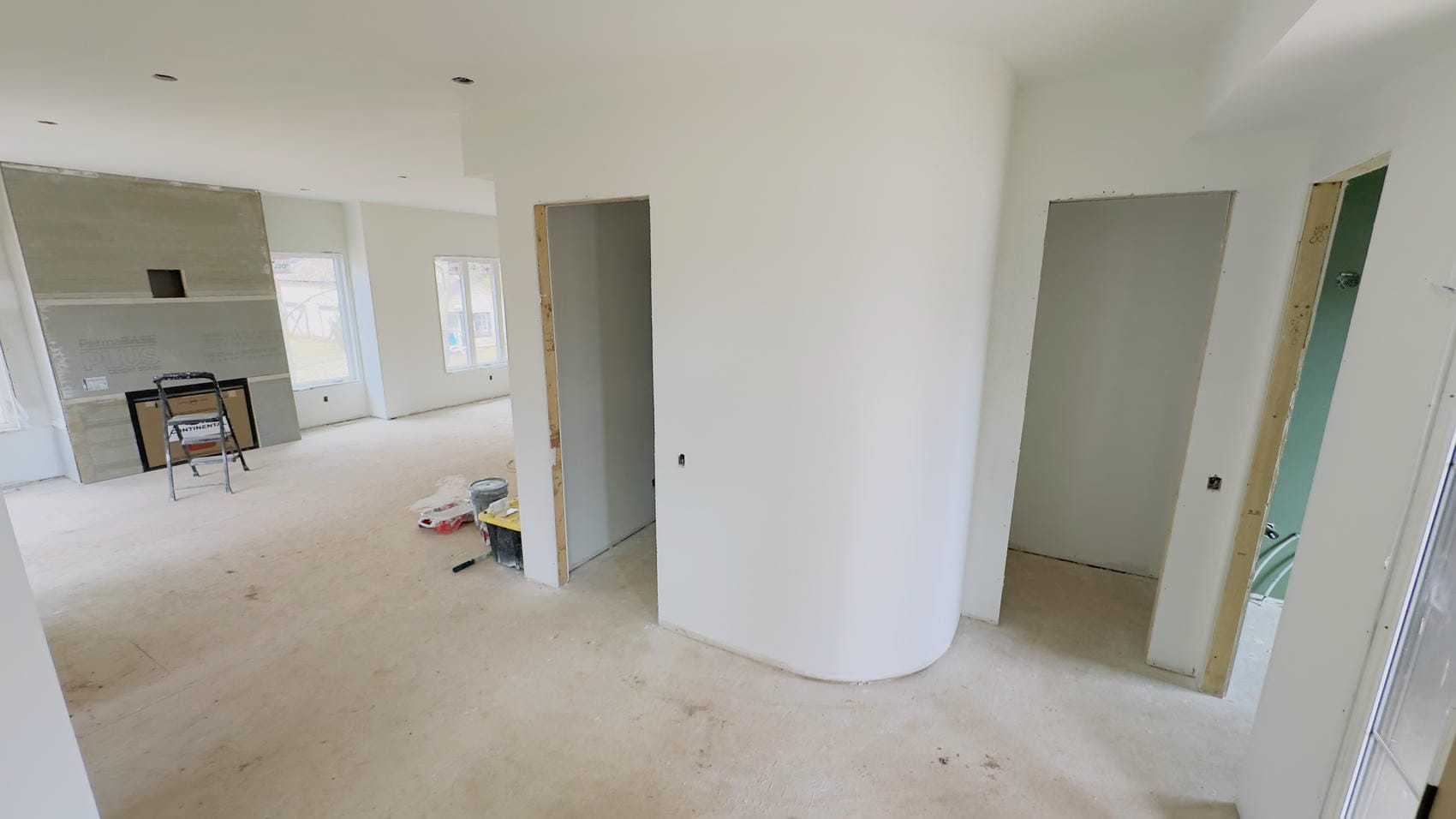 Painted interior walls, ceiling, and curved bulkhead in Niagara renovation