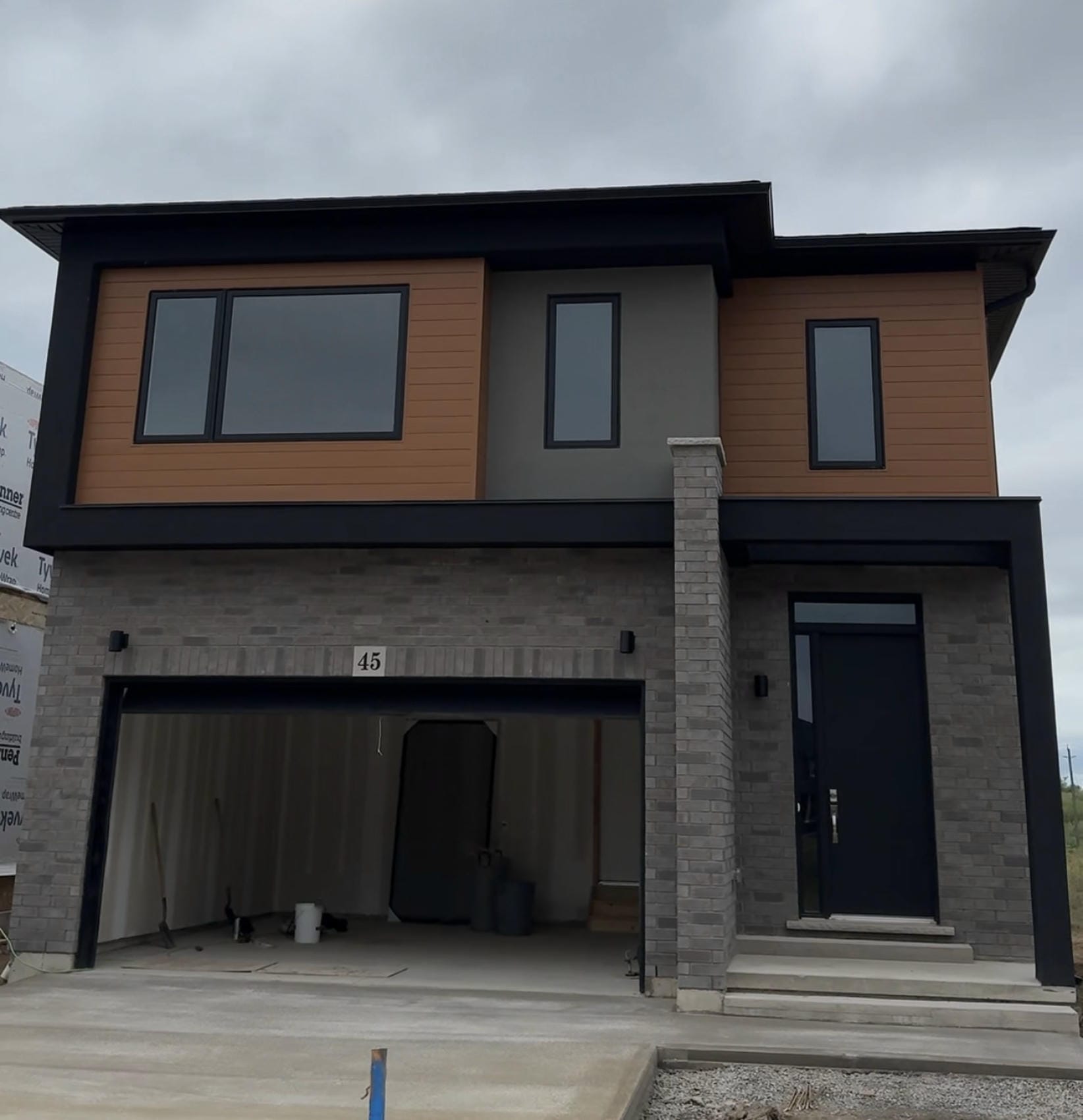 Modern aluminum and metal siding project in Niagara Region — front elevation