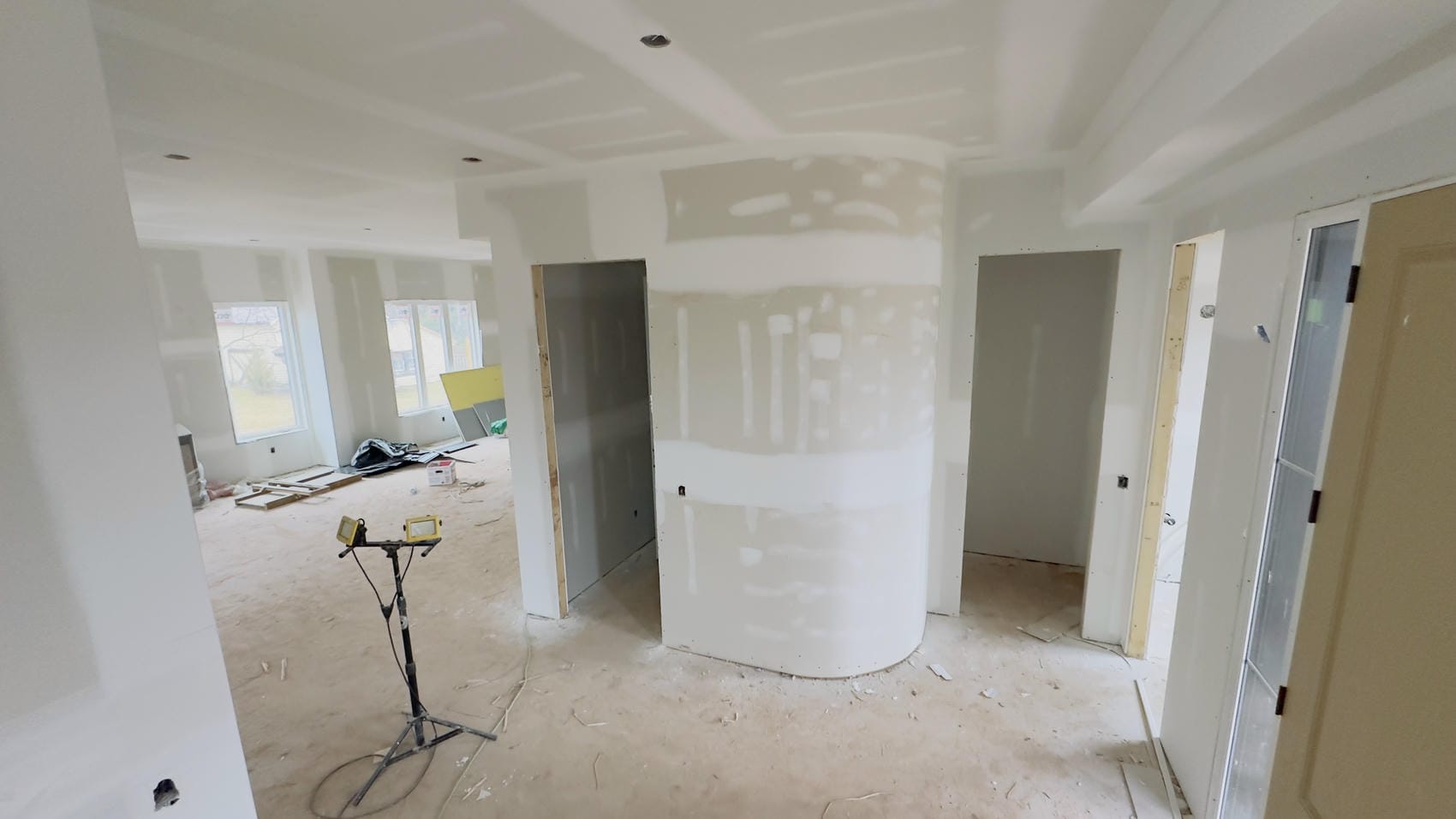 Drywall installation with curved wall and ceiling boarding in Niagara home